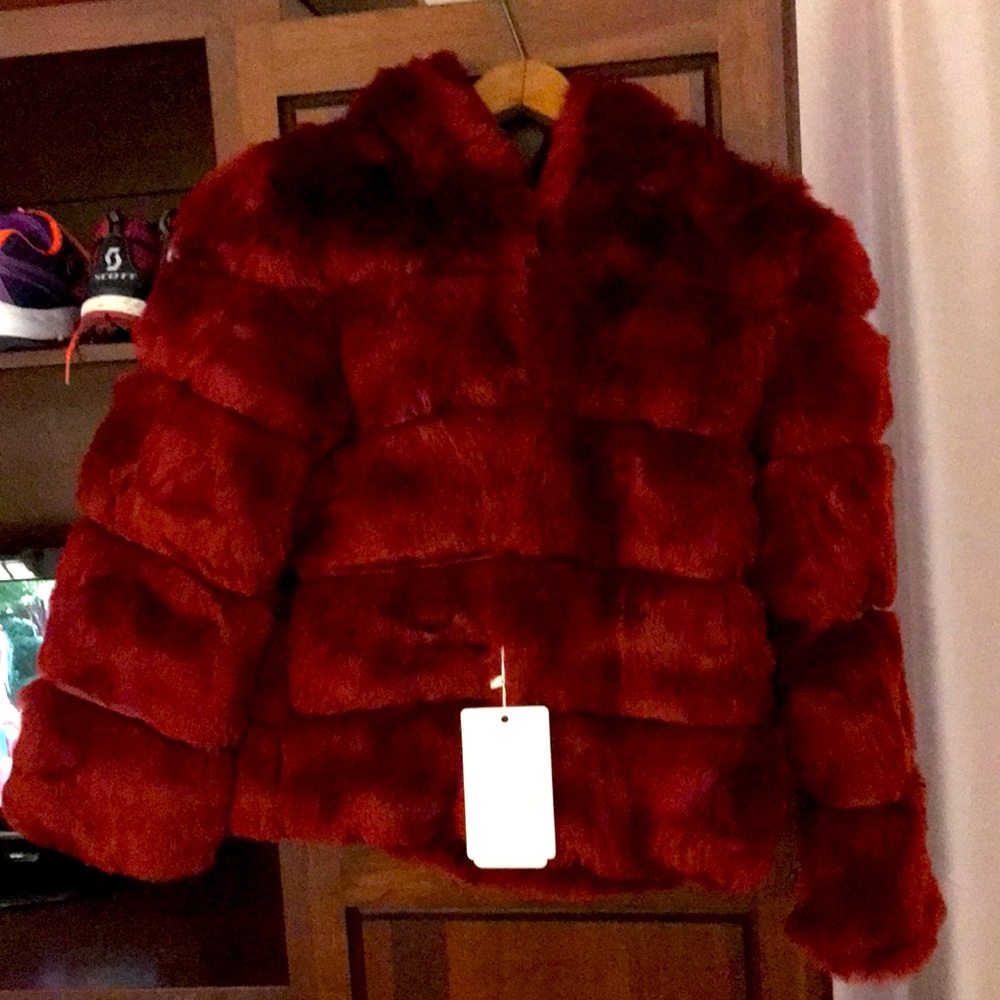 NEW x small burgundy faux fur jacket with hood. Tag gone but never worn.